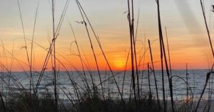 Sunset through the dunes at Safety Harbor Beach Upper Captiva, FL